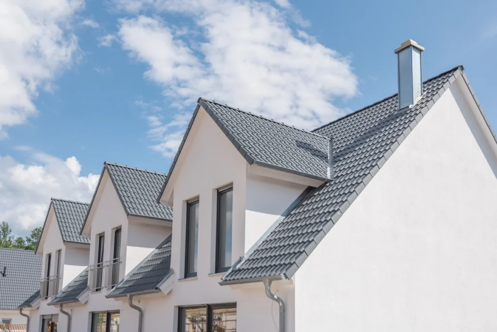 newly built houses and gray roofs